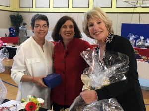 Barbara Goldstone, Susie Yuré, Lydia Friedlich with auction winnings    